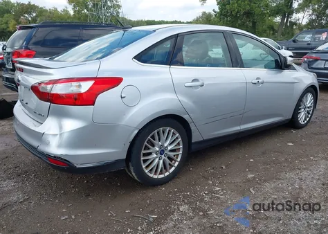 2014 Ford Focus Titanium from USA, damaged, VIN 1FADP3J28EL223087